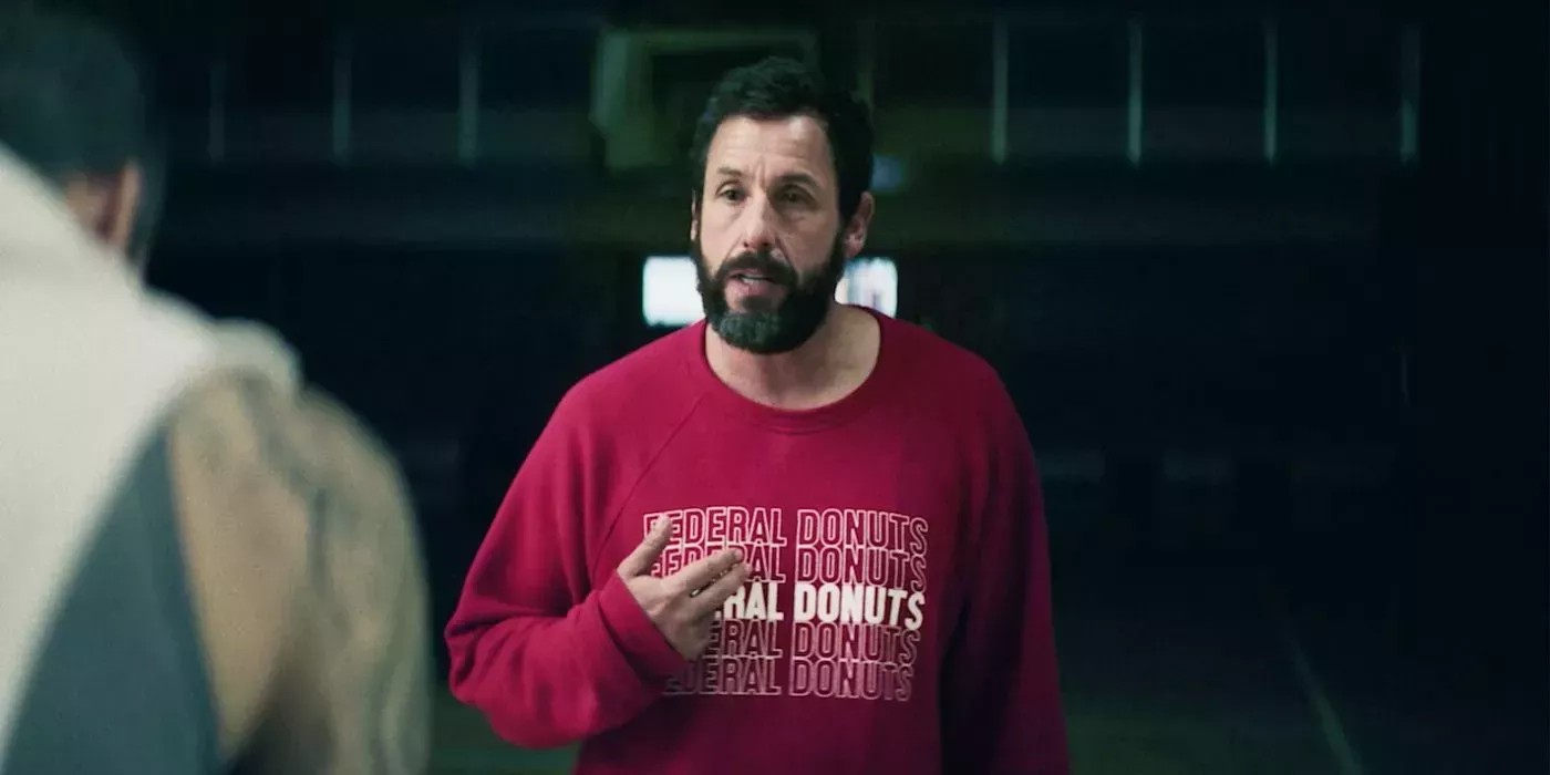 Adam Sandler pointing at himself in Netflix's Hustle