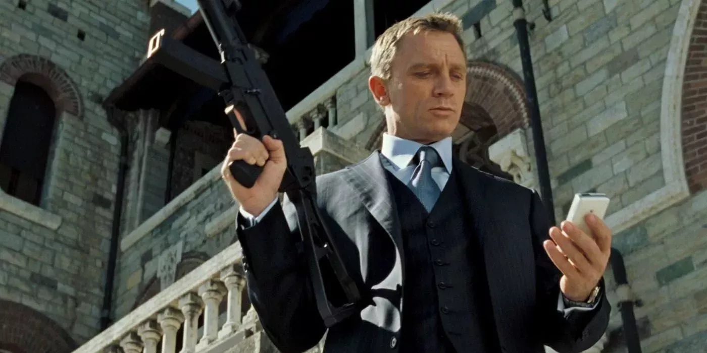 Daniel Craig's James Bond holds a gun at the end of Casino Royale