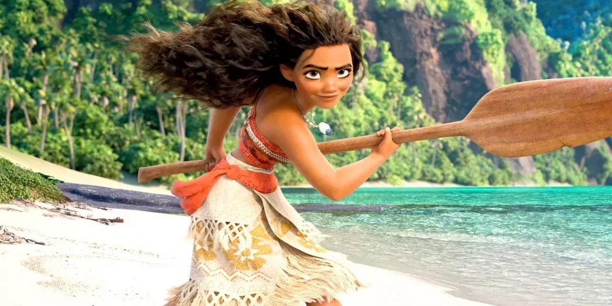 Moana is holding her oar with a determined smile (Moana)