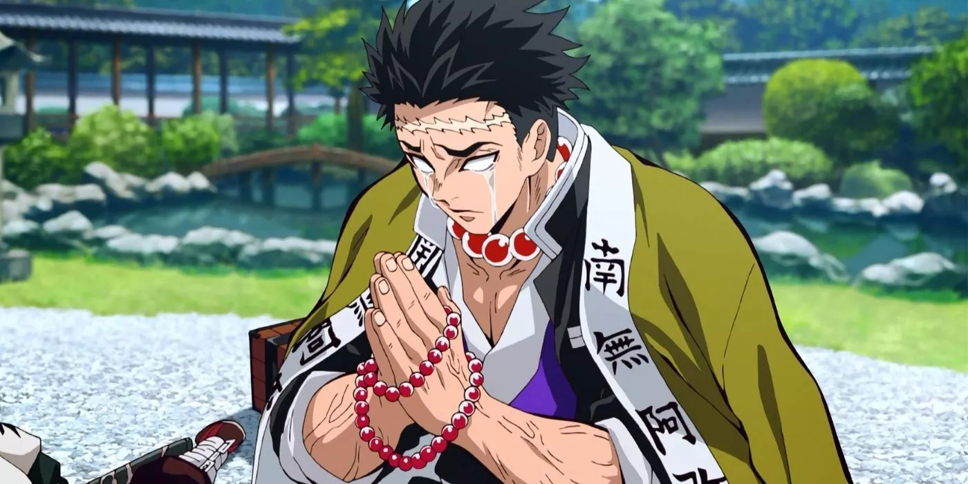 Gyomei Himejima, the Stone Pillar Hashira, prays as tears run over his cheeks