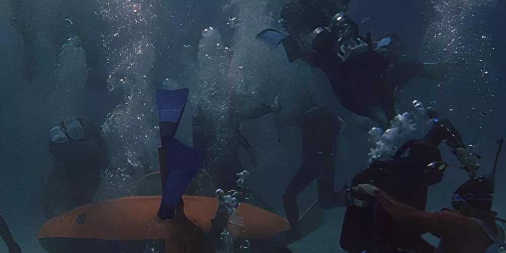 A large scale battle unfolds under water between US military and Bond villains