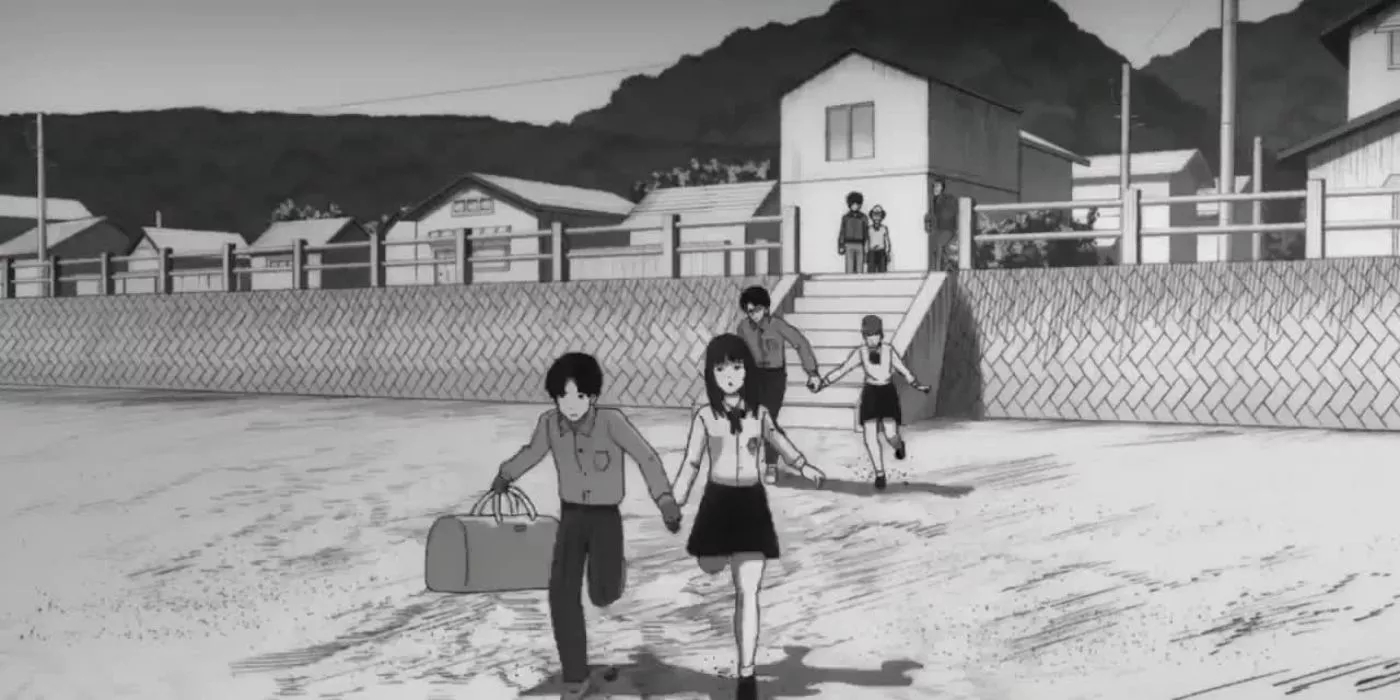 Los dos amantes corren por la playa en el episodio 2 de Uzumaki.