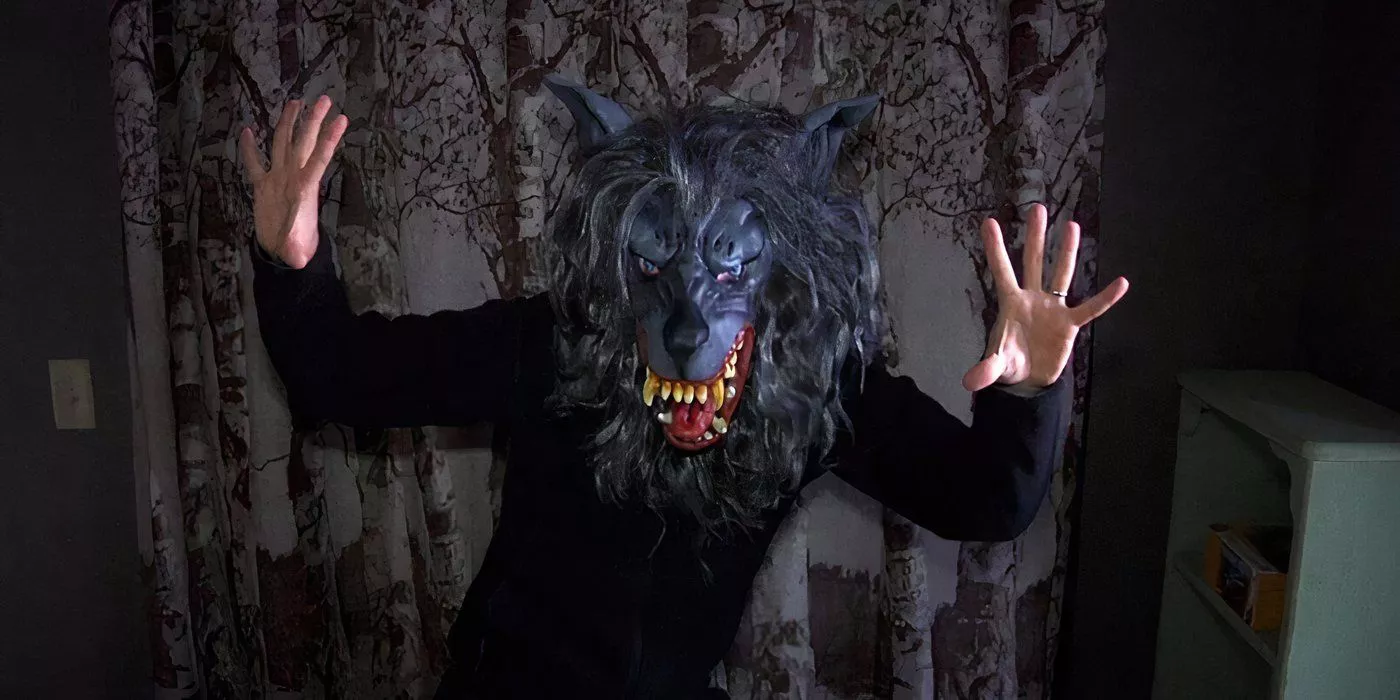 Josef is wearing the scary wolf mask and becoming Peach Fuzz in Creep