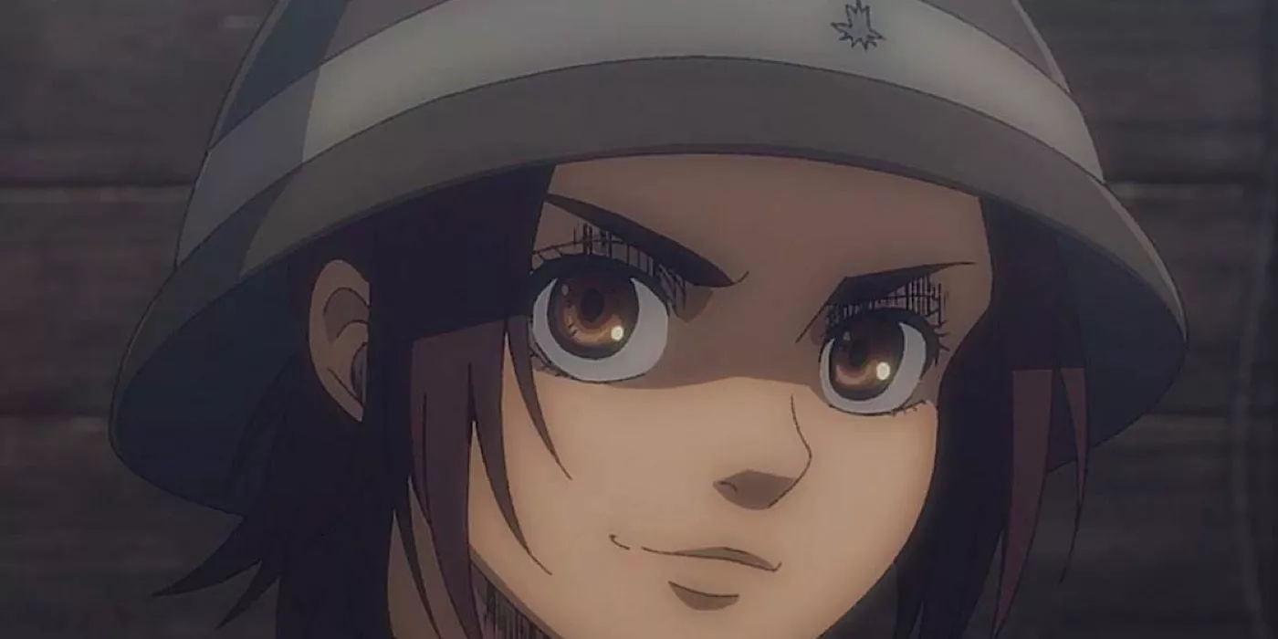 Gabi Braun looking determined and smiling in Attack On Titan.