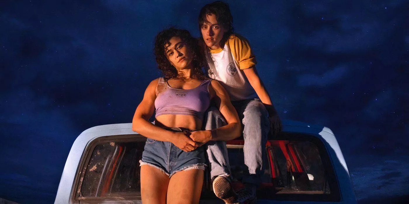 Kristen Stewart as Lou and Katy O'Brien as Jackie sitting on the top of Lou's truck thinking about a way to leave town in Love Lies Bleeding.