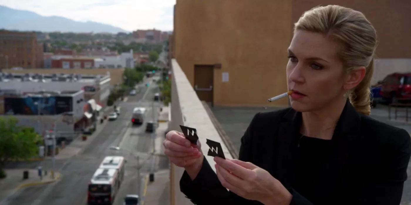 Better Call Saul Inflatable episode - Kim Wexler smokes a cigarette outside Shweikart and Cokely