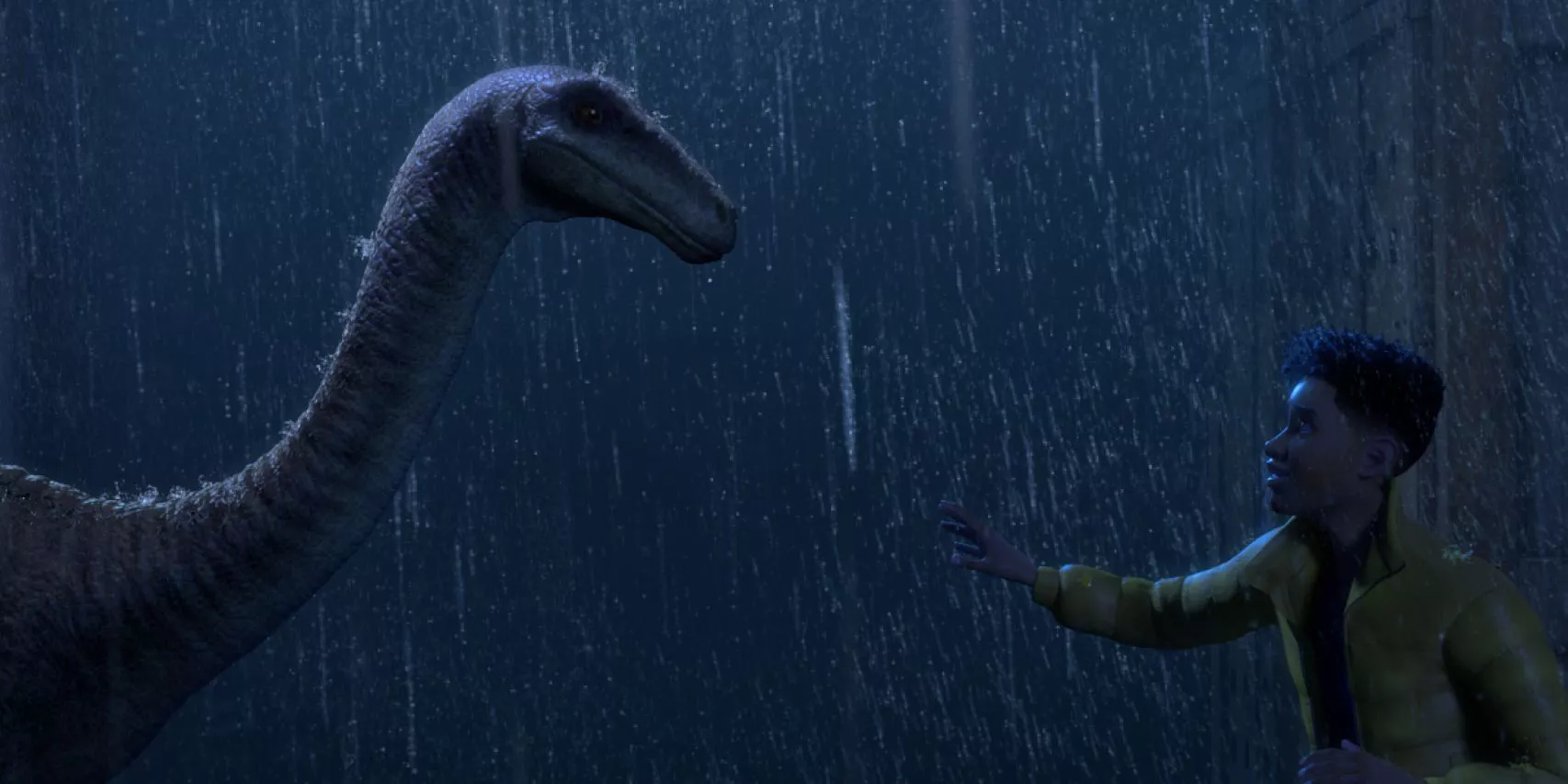 Darius reaches out to a Gallimimus in the rain in Jurassic World Chaos Theory