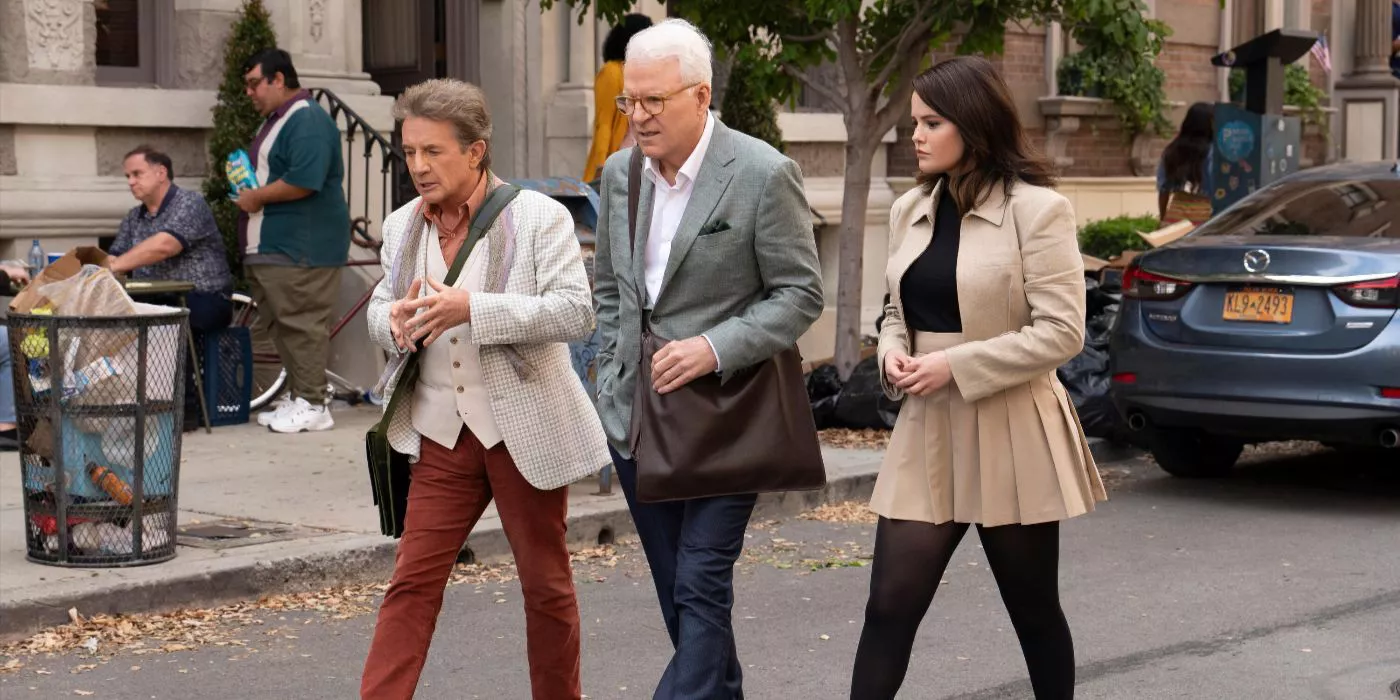 Martin Short, Steve Martin and Selena Gomez walk across the street in Only Murders in the Building Season 4