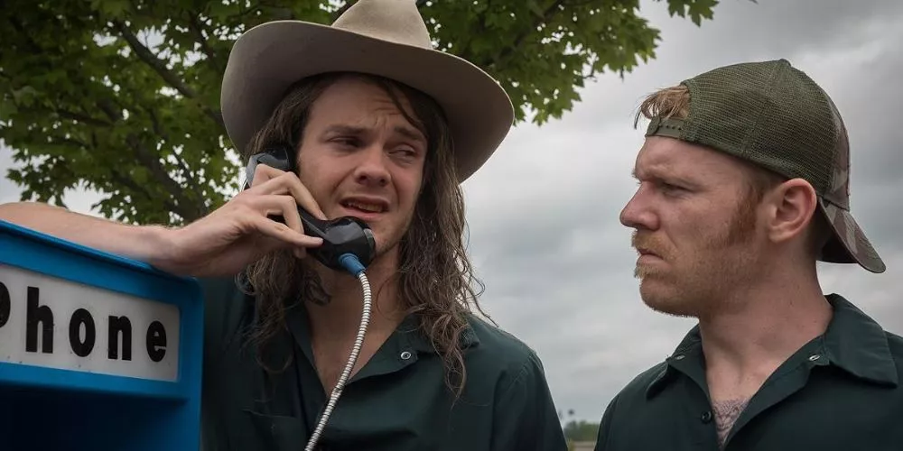 Jack as Fish talking on a pay phone in Logan Lucky