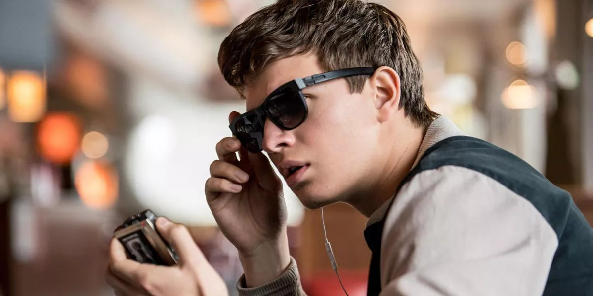 Baby (Ansel Elgort) listens to his mixtape