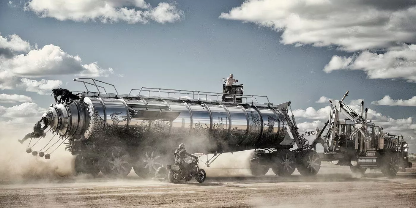 Road gangs attack the new Citadel War Rig on the Fury Road while Furiosa hides underneath it in Furiosa: A Mad Max Saga.