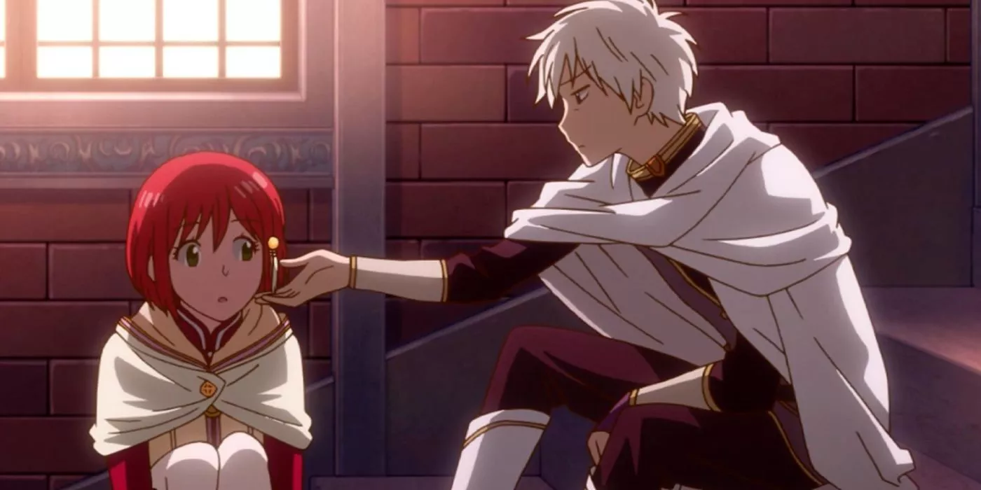 Prince Zen touching Shirayuki's hair on the stairs in Snow White with the Red Hair.