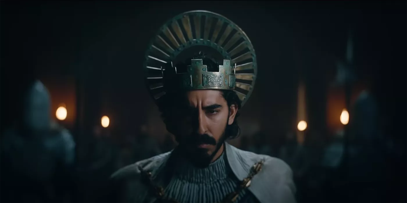 Dev Patel wearing a crown in The Green Knight