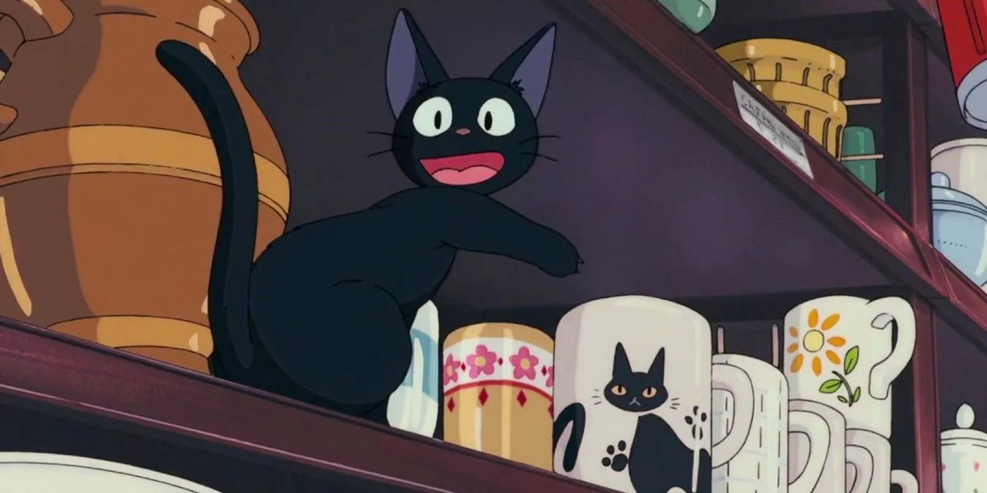 Jiji encuentra una taza de gato negro en Kiki's Delivery Service.