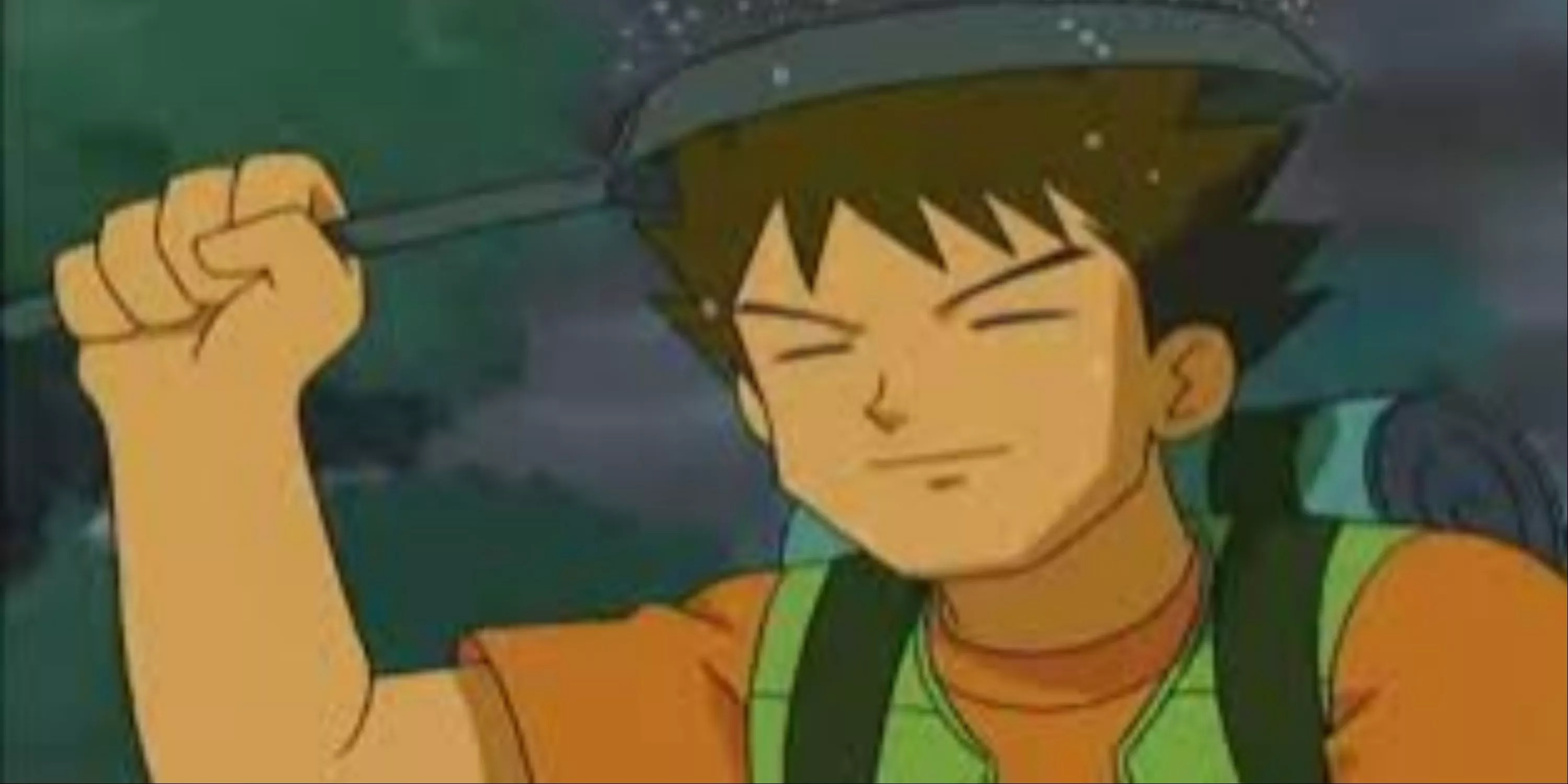 Brock protegiéndose de la lluvia usando una sartén en Pokémon.