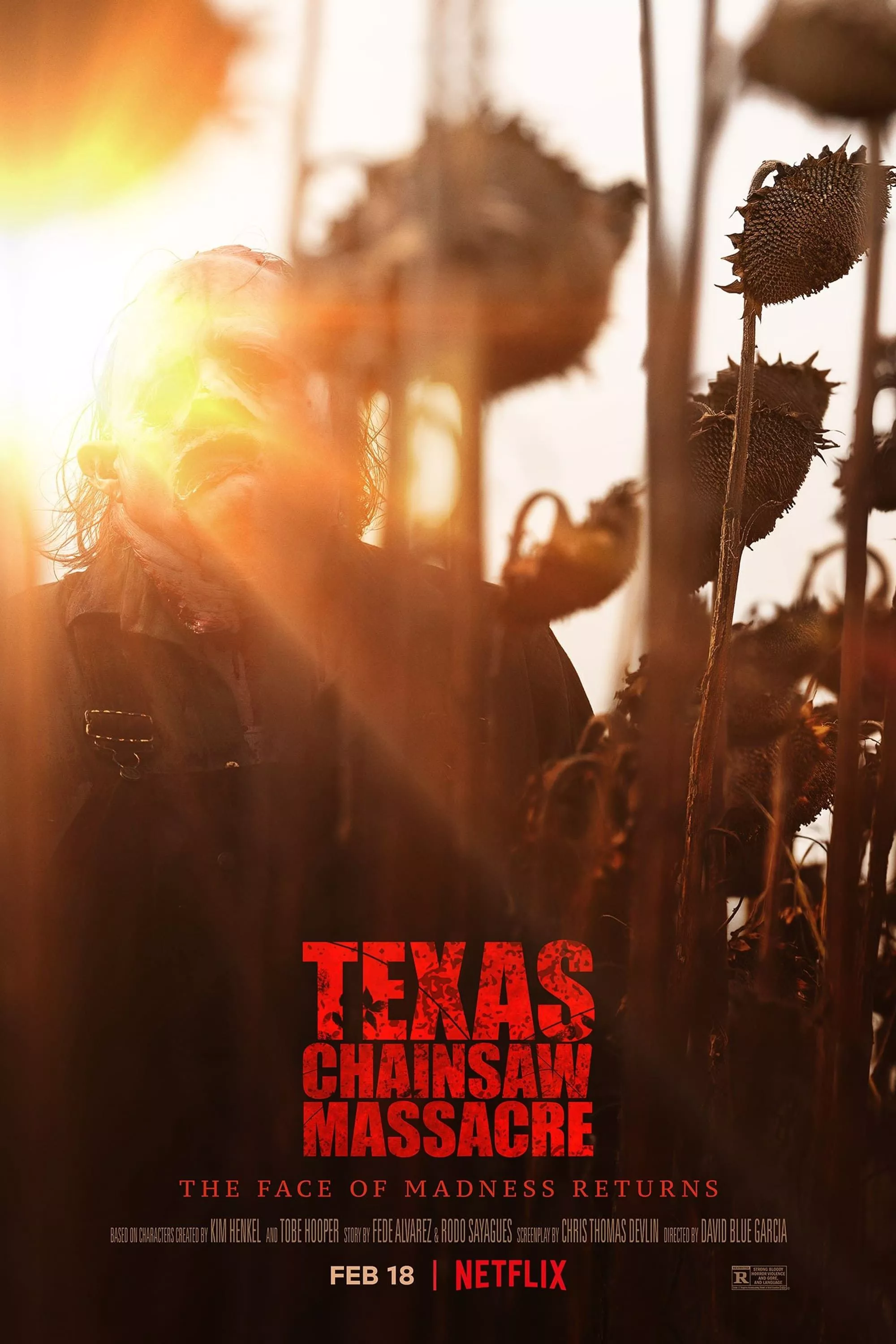 The Texas Chainsaw Massacre Film Poster depicts Leatherface behind a lensflare in a sunflower field.