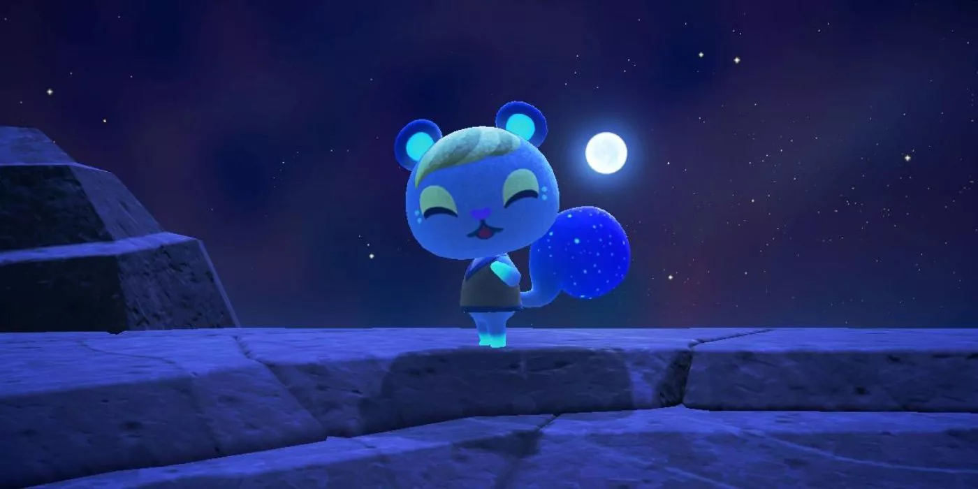 Ione sonriendo a la luz de la luna en una roca de playa en Animal Crossing New Horizons.