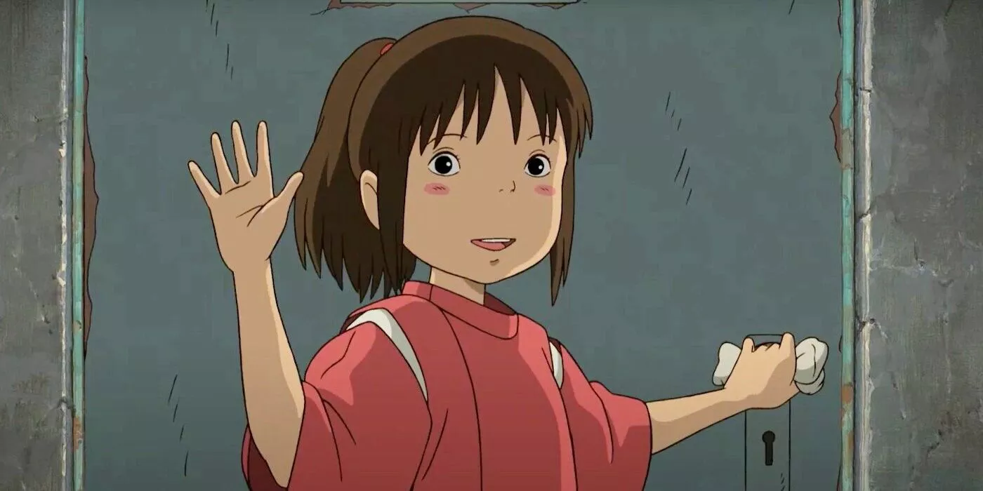 Chihiro raises her hand to wave in Hayao Miyazaki's Spirited Away.