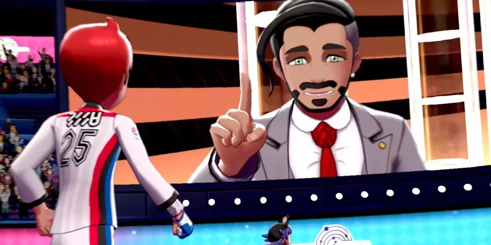 El presidente Rose interrumpe la partida del Campeón de la Liga Pokémon para anunciar que está comenzando el Día Más Oscuro en Pokémon Sword and Shield.