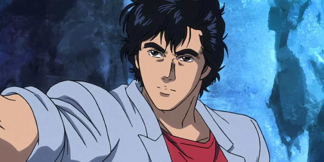 Ryo Saeba de City Hunter sosteniendo su brazo hacia afuera