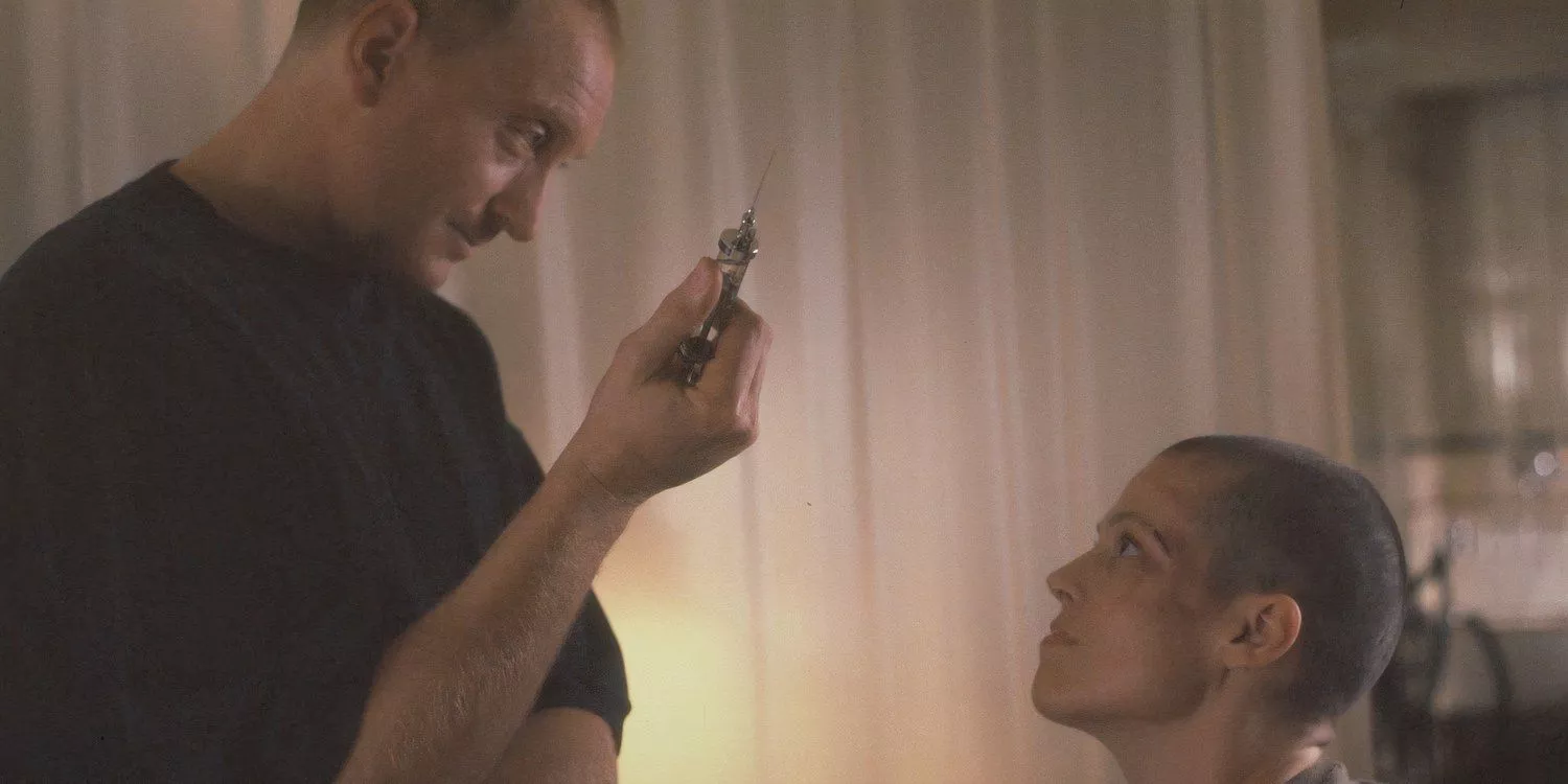 Clemens holds a syringe talking to Ripley in Alien 3.