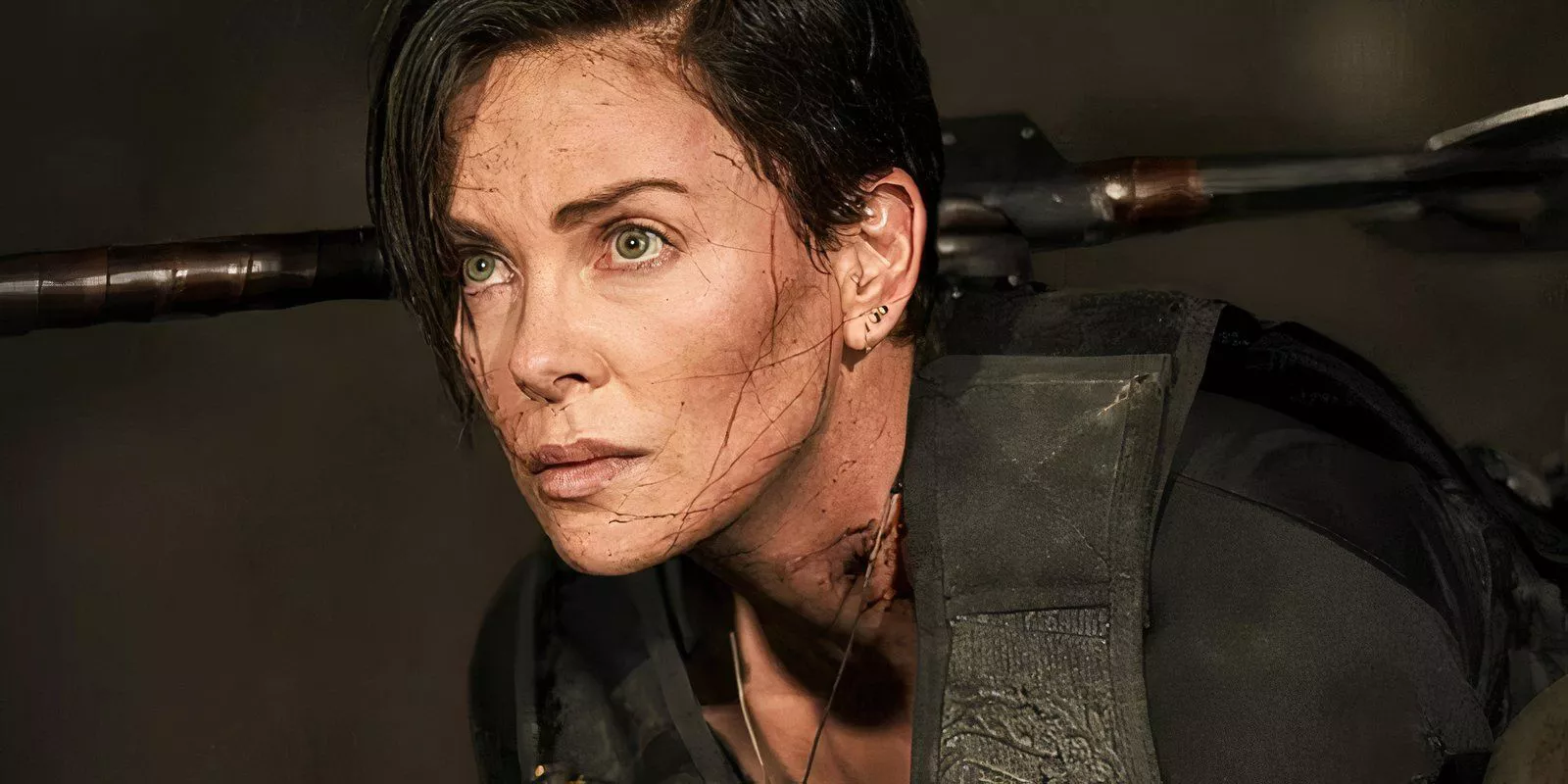 Charlize Theron is battle damaged in The Old Guard