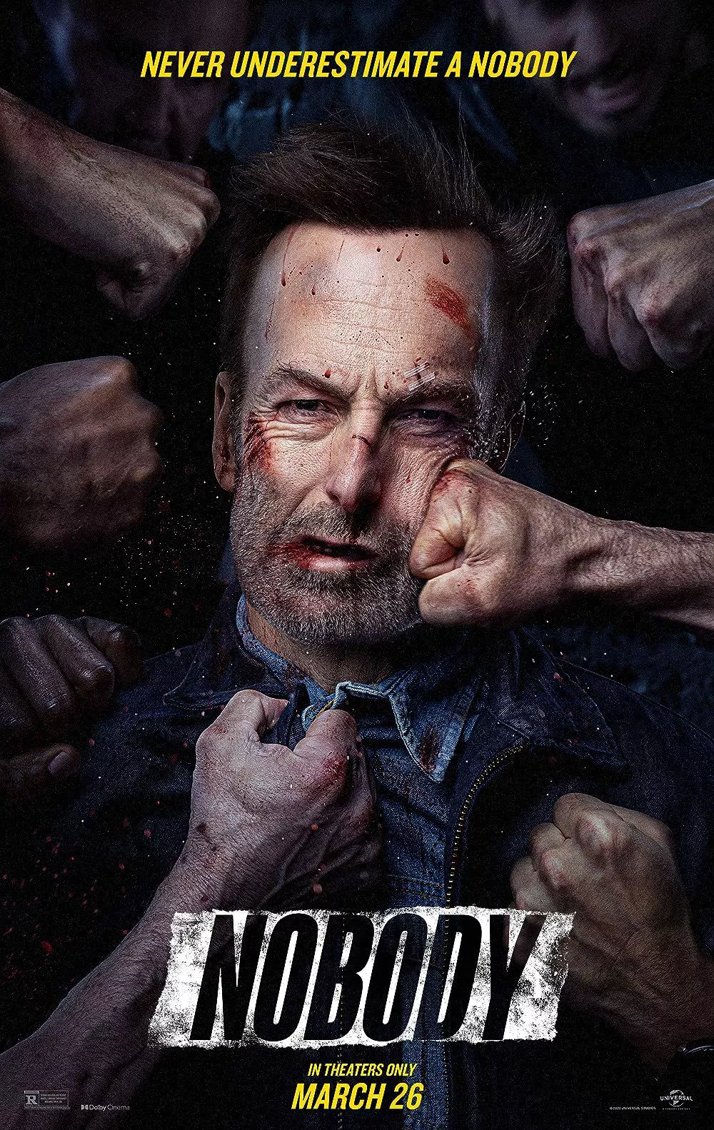 Un montón de puños anónimos golpean a Hutch Mansell (Bob Odenkirk) en el cartel de Nobody.