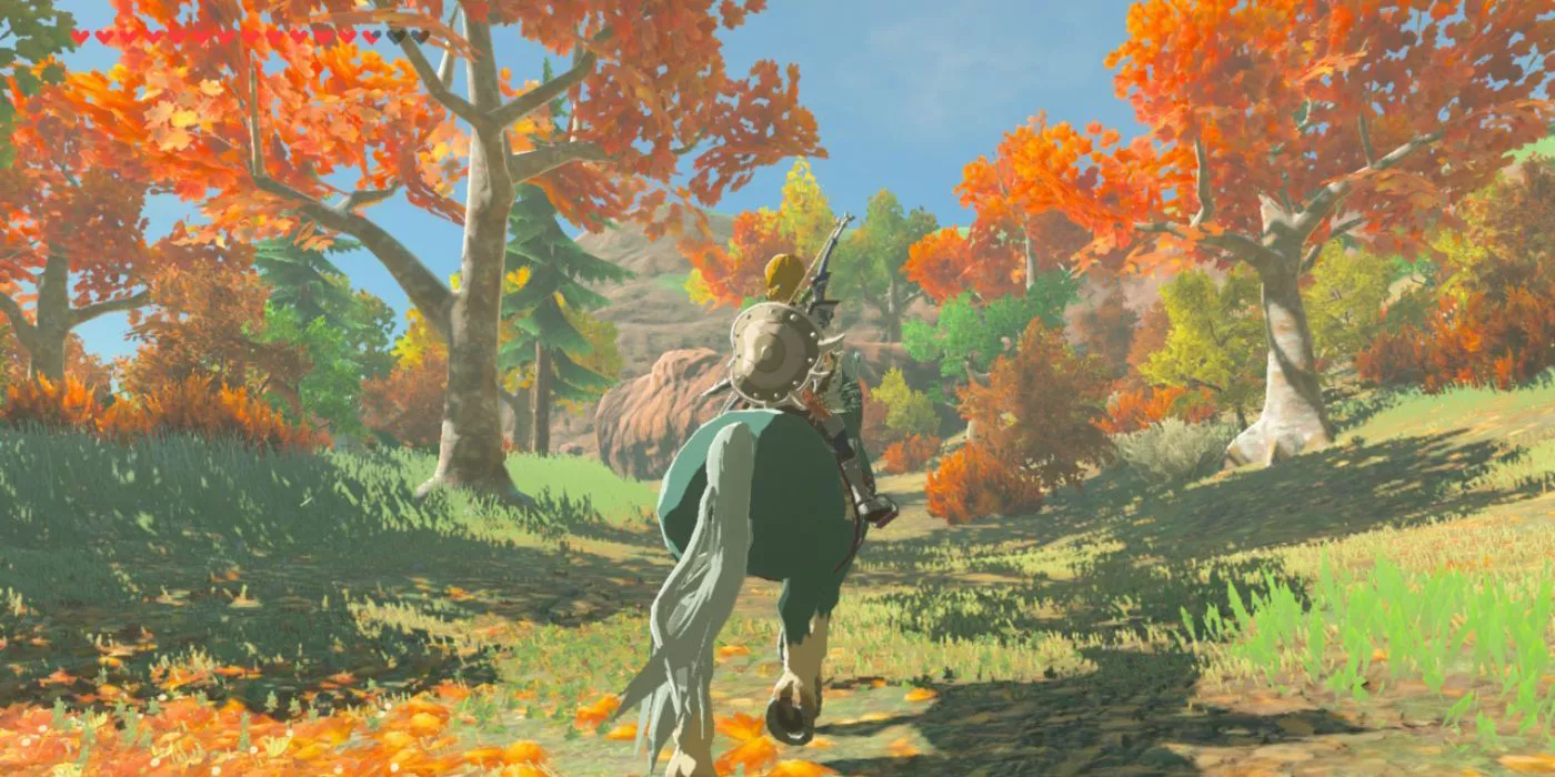 Link riding a horse through the Akkala region in Breath of the Wild