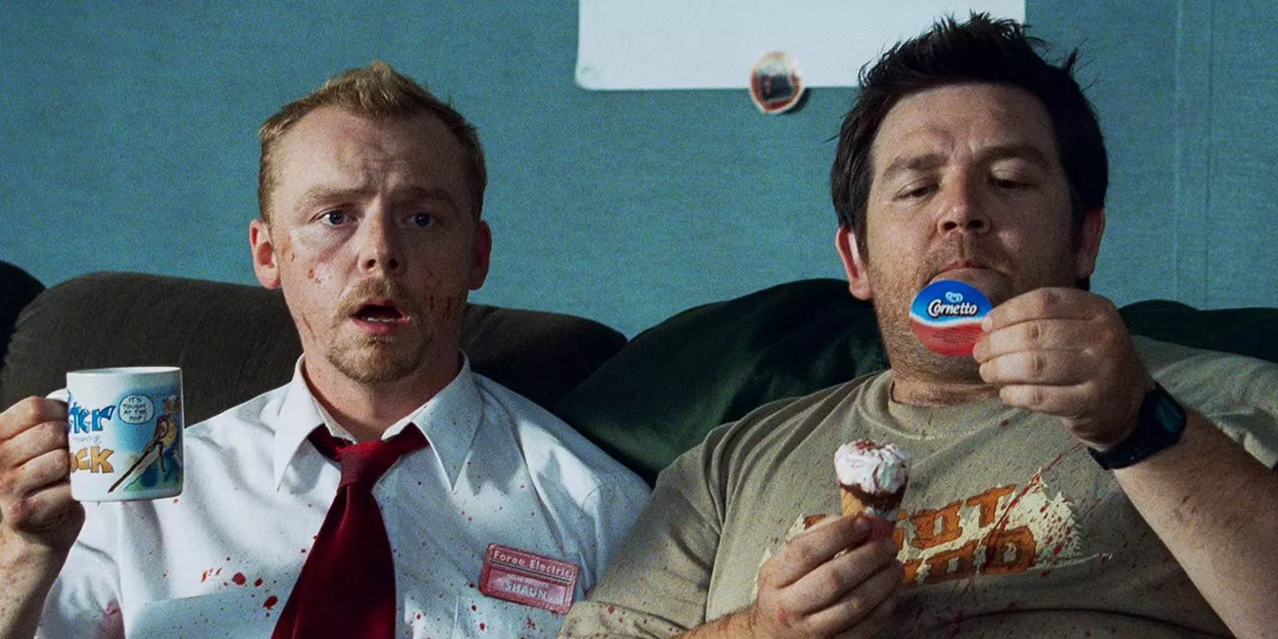 Shaun and Ed watch the news as they eat Cornettos