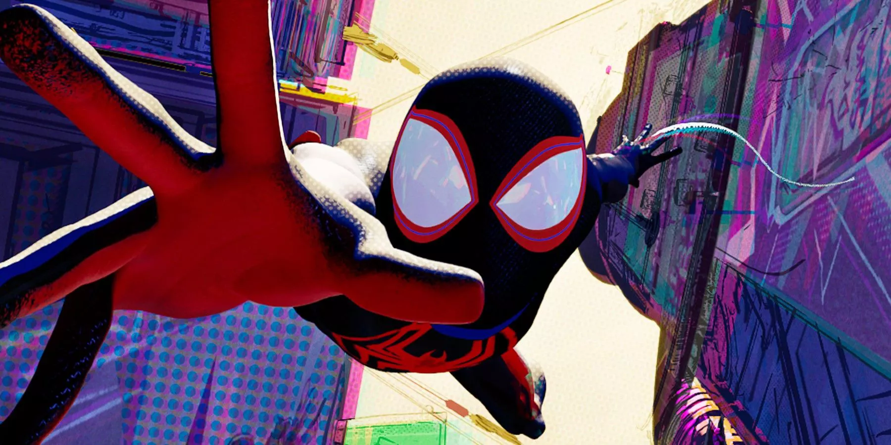 Miles Morales falls to the ground with his hand in front of him in Spider-Man: Across The Spider-Verse