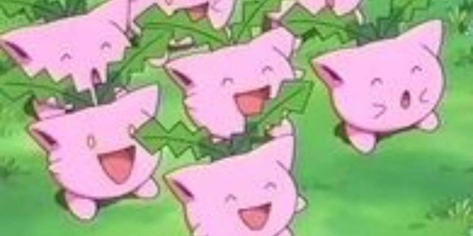 A group of happy Hoppips in the grass in Pokémon: The Johto Journeys