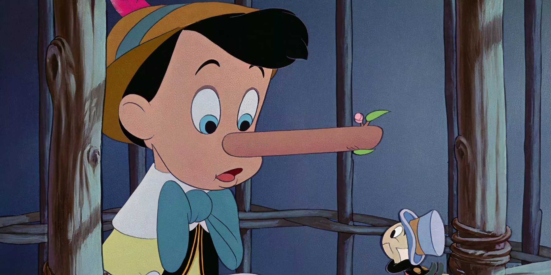 Pinocchio's nose grows after he tells a lie while Jiminy Cricket watches in Pinocchio