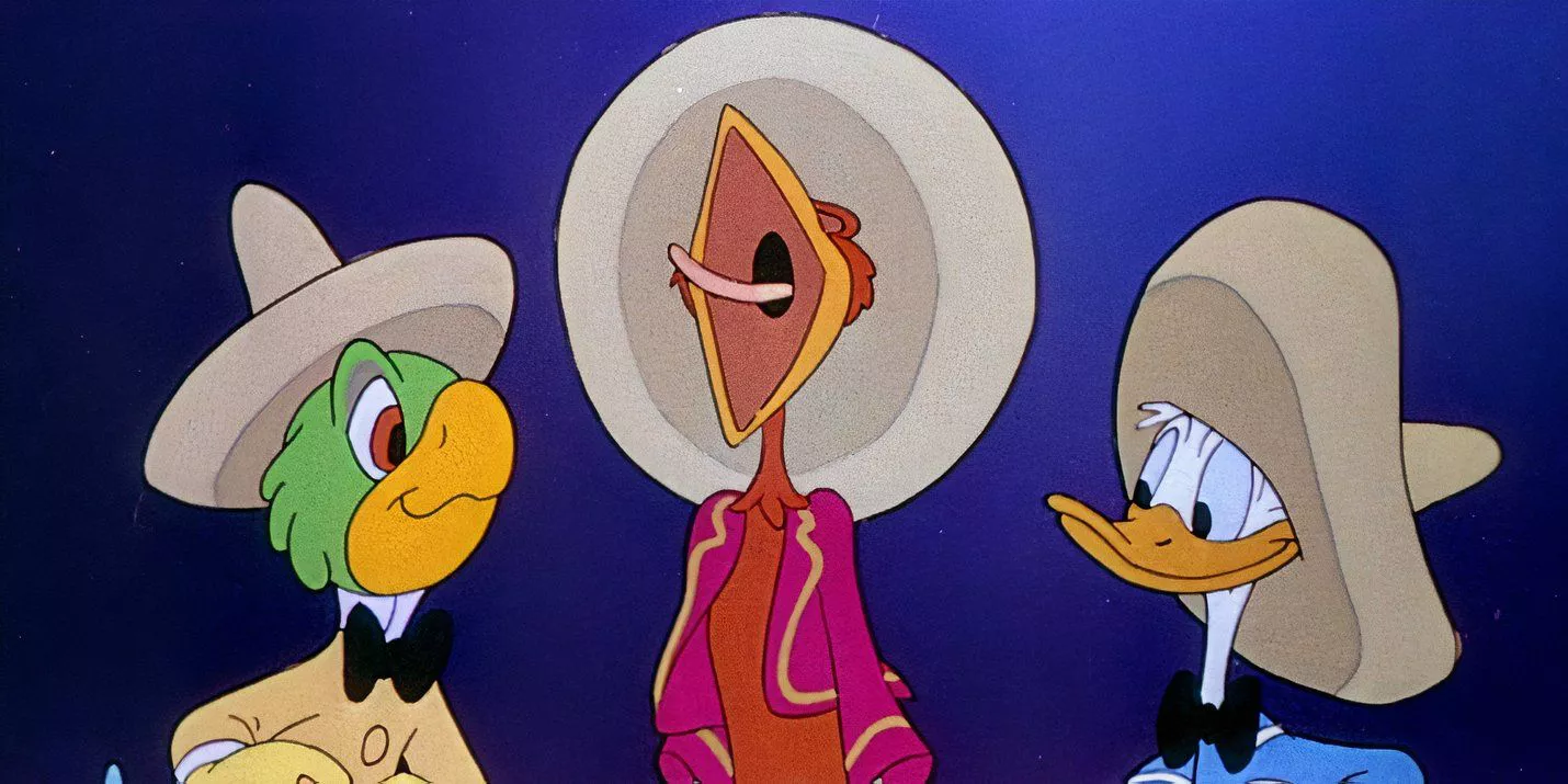 The rooster is singing and the parrot is smiling at Donald Duck in The Three Caballeros