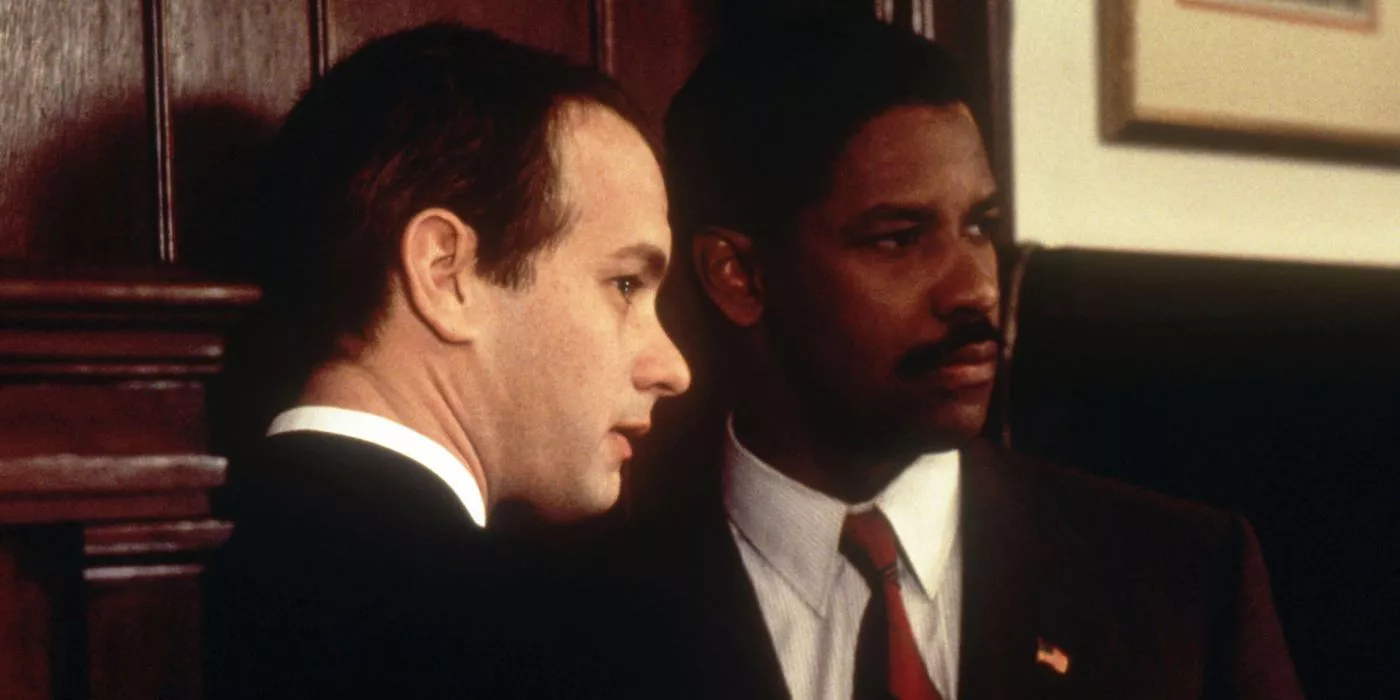 Tom Hanks and Denzel Washington look at something off camera in Philadelphia.