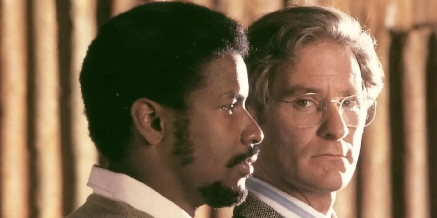 Denzel Washington and Kevin Kline stand close to each other in Cry Freedom.