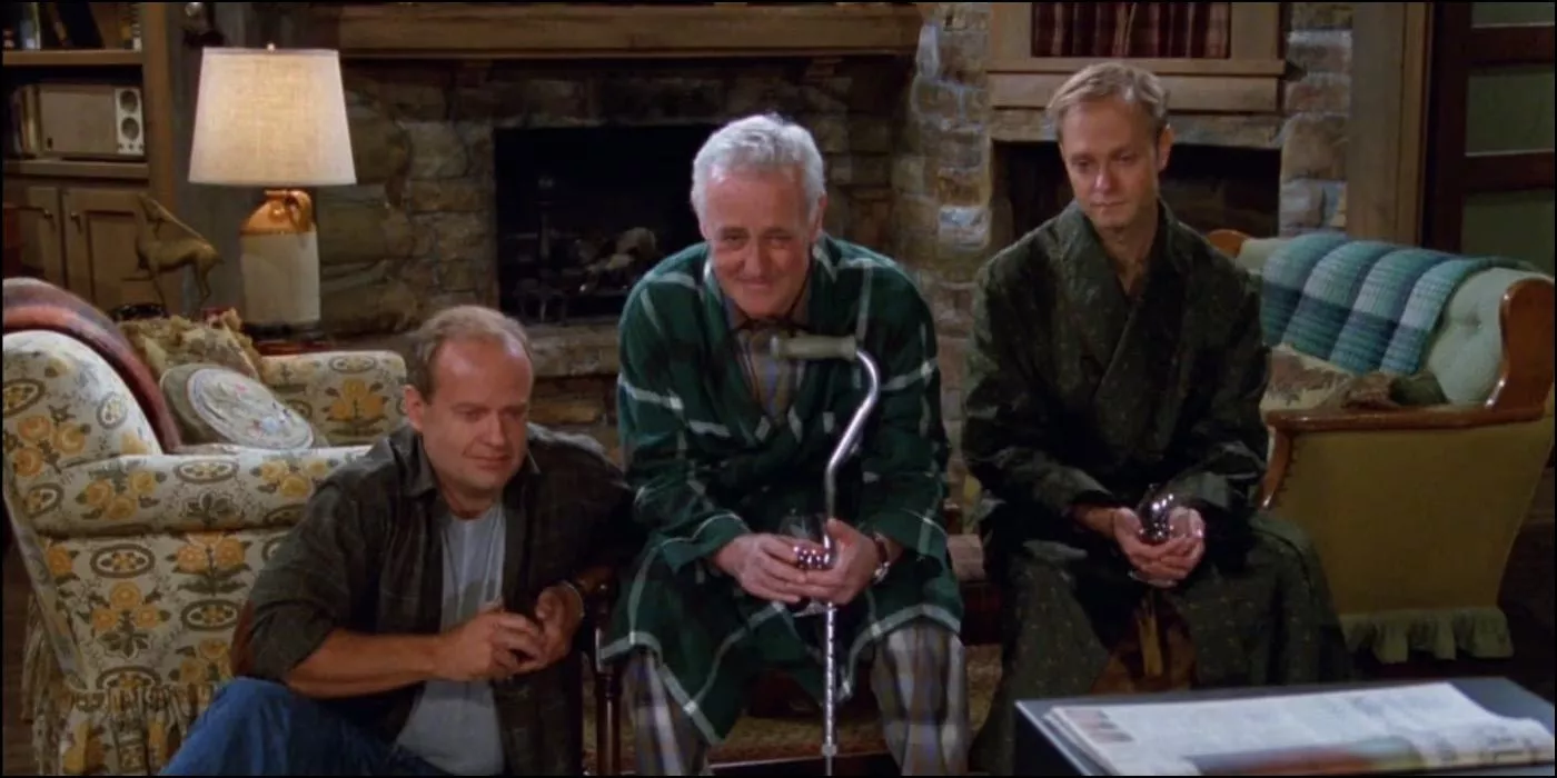 Frasier, Martin, and Niles watching home videos in their cabin