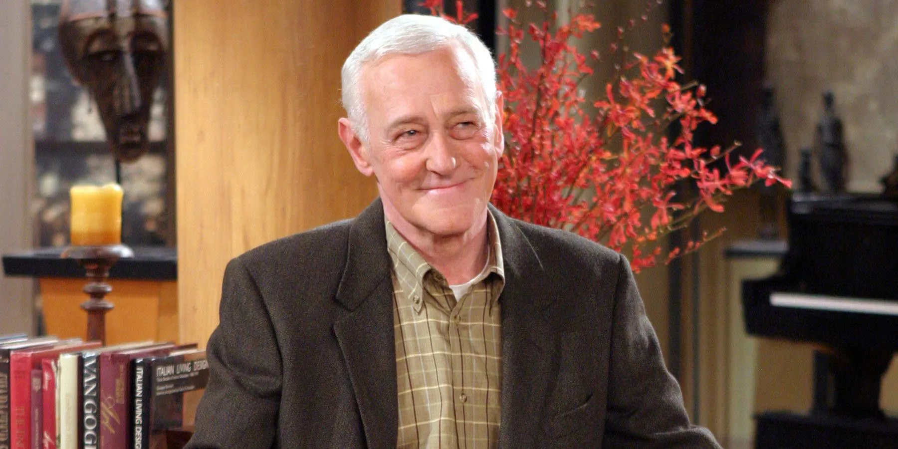 John Mahoney's Martin Crane sits in a room during a scene from Frasier