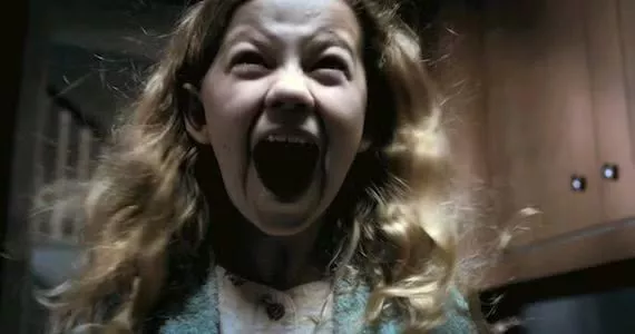 A girl screams in movie Mama.