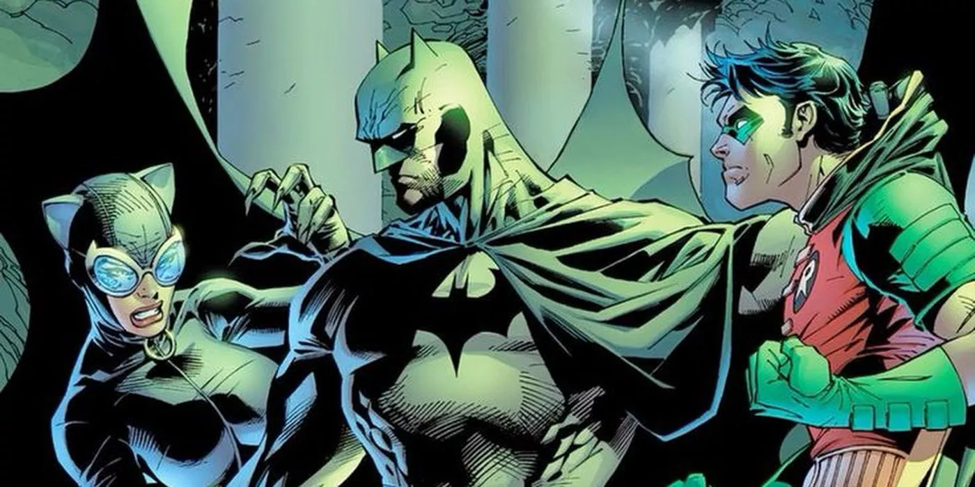 Batman breaks up a fight between Catwoman and Robin in Hush