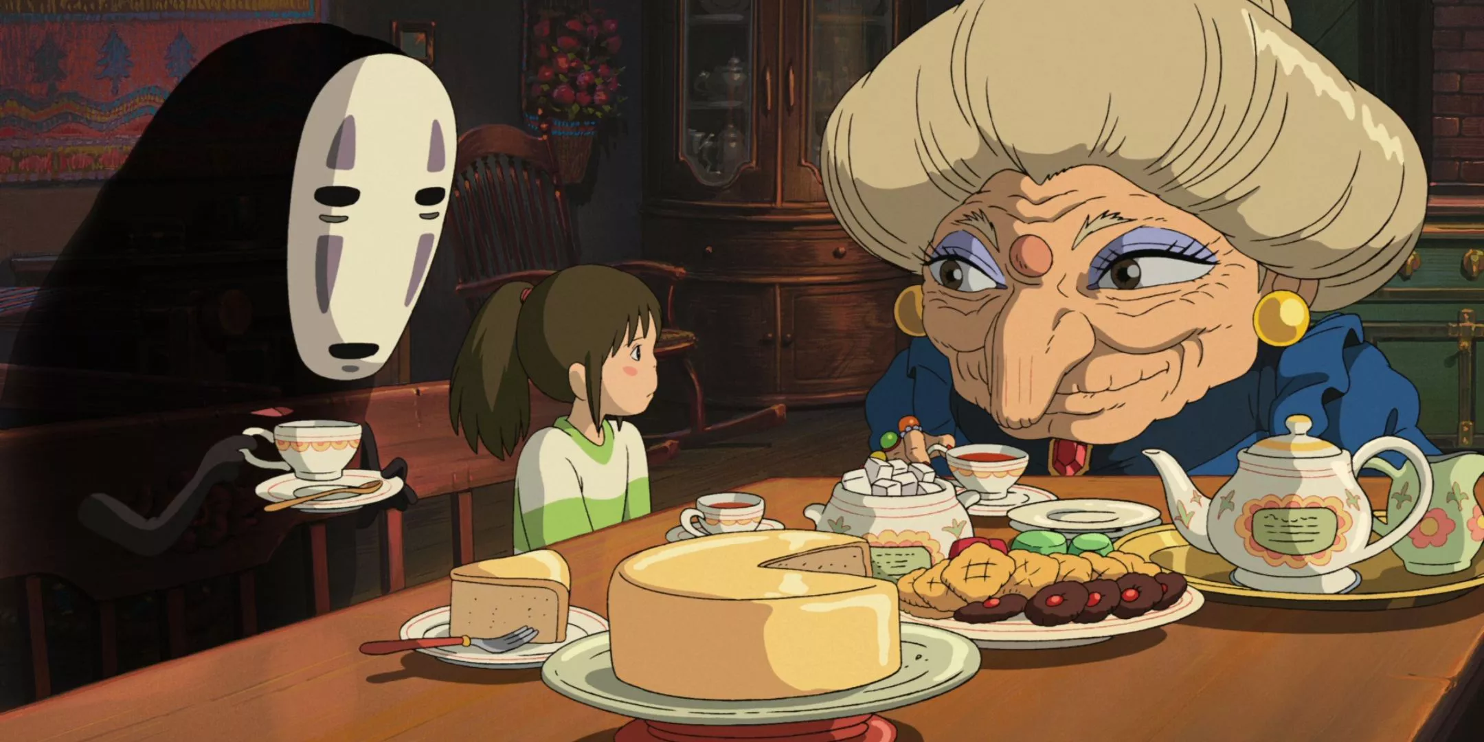 Chihiro tomando té con Zeniba y No Face en El Viaje de Chihiro