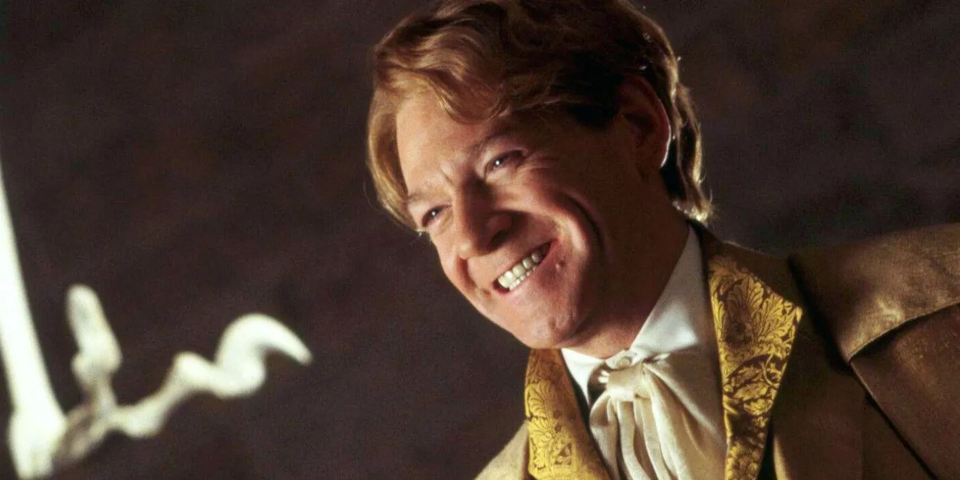 Gilderoy Lockhart (Kenneth Branagh) smiles triumphantly in Harry Potter and the Chamber of Secrets.