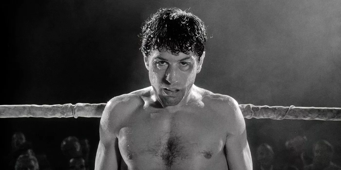 Robert De Niro as Jake LaMotta in the middle of a big boxing match moments before losing in Raging Bull.