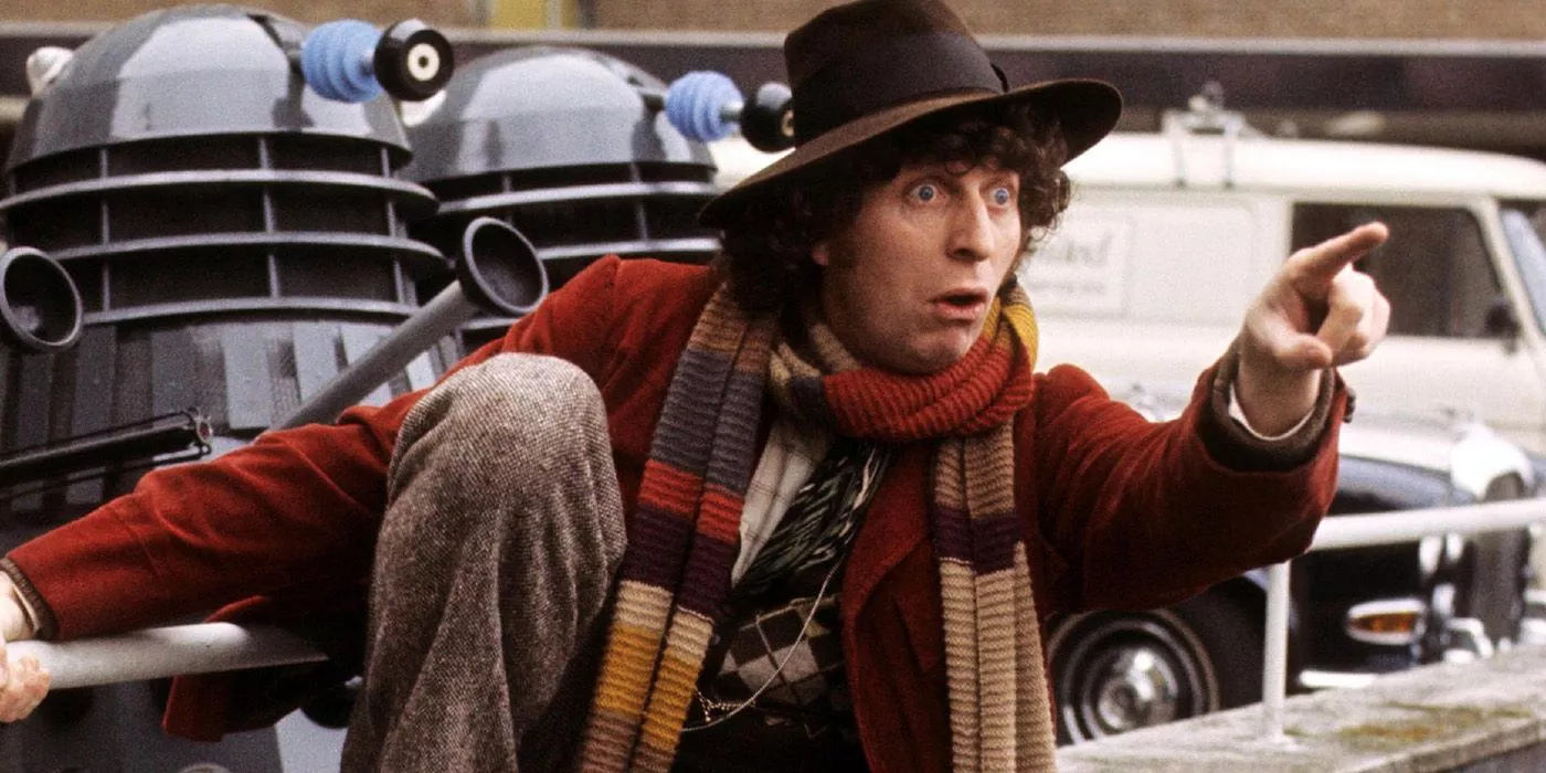 Tom Baker as the 4th Doctor is flanked by Daleks in Doctor Who