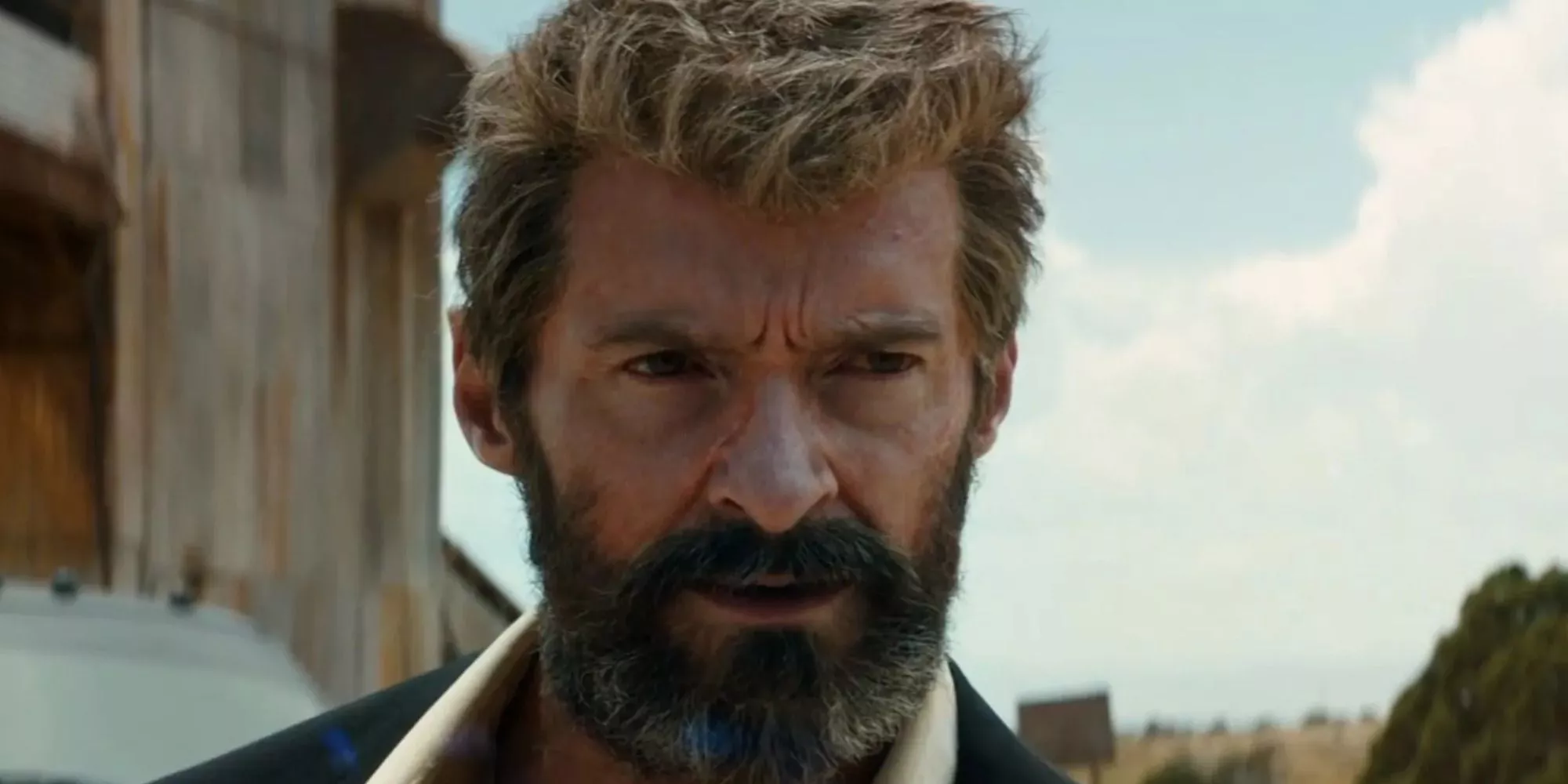 Logan (Hugh Jackman) looks into the camera in Logan.