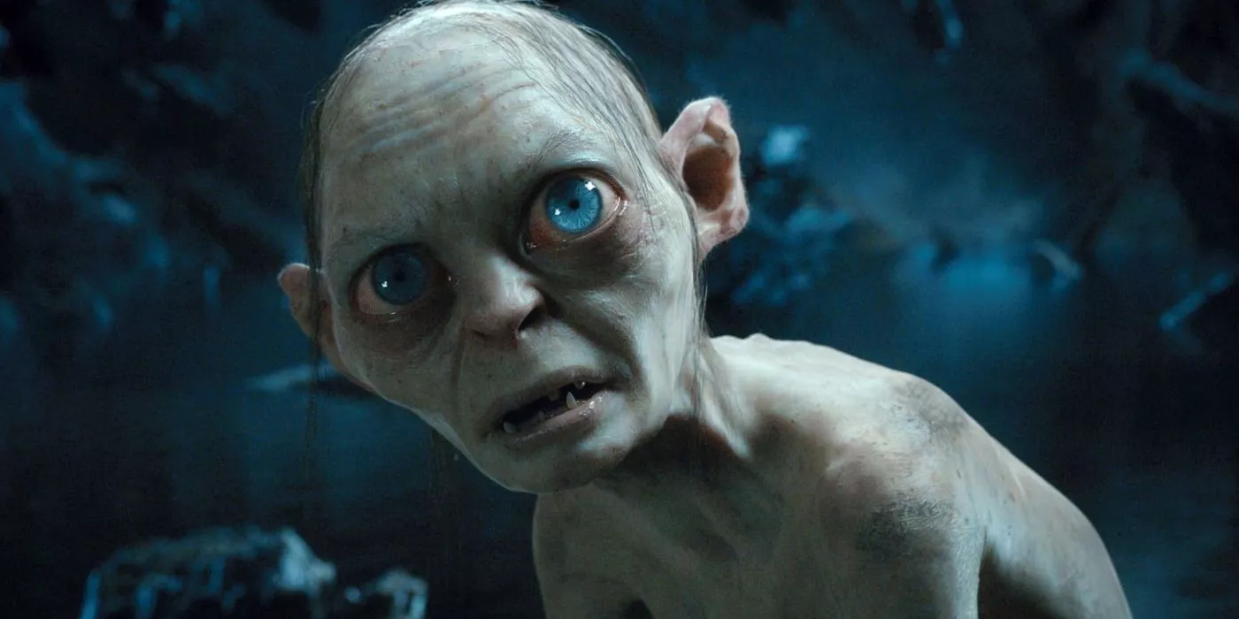 Gollum parece asustado frente a un fondo oscuro en El Señor de los Anillos.