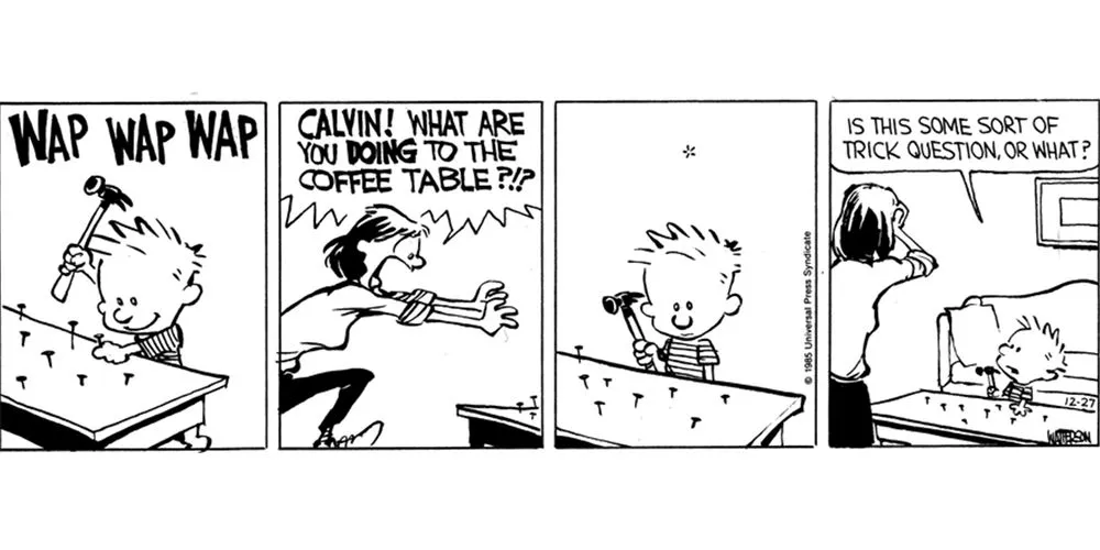 Calvin entertains himself by hammering nails into a table in Calvin & Hobbes.