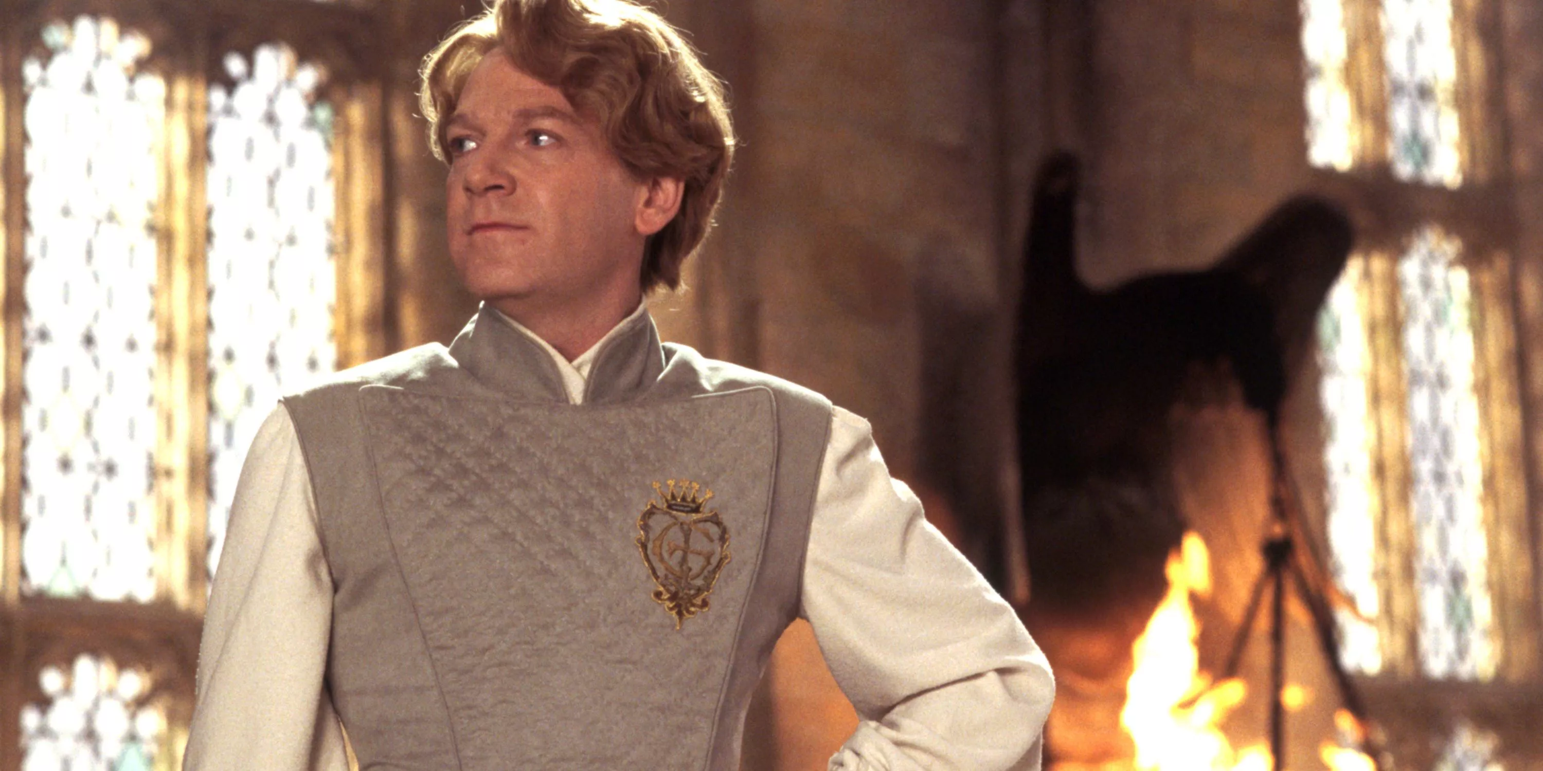 Gilderoy Lockhart from the Harry Potter series looks off to the side, hand resting on his hip.