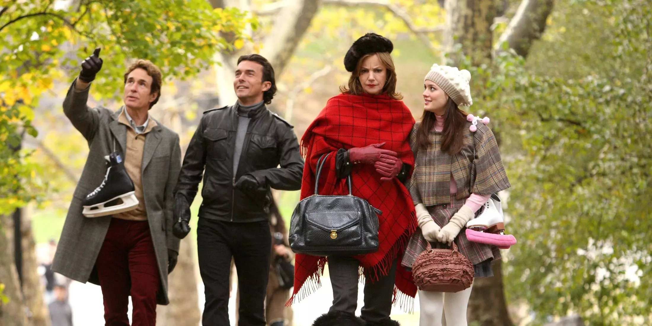 Blair walks with her parents and Roman in the park in Gossip Girl.