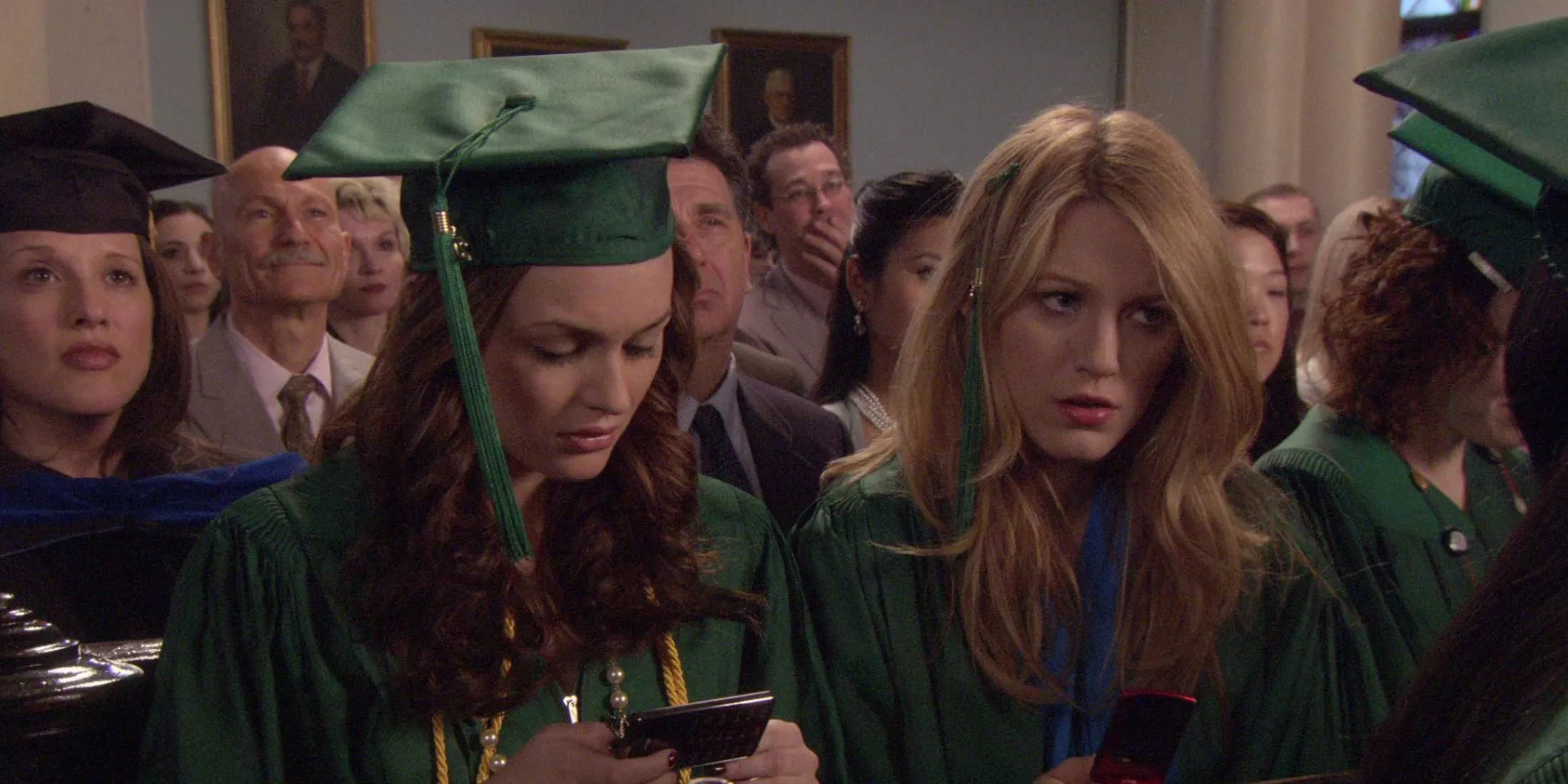 Blair and Serena on their graduation ceremony in Gossip Girl.