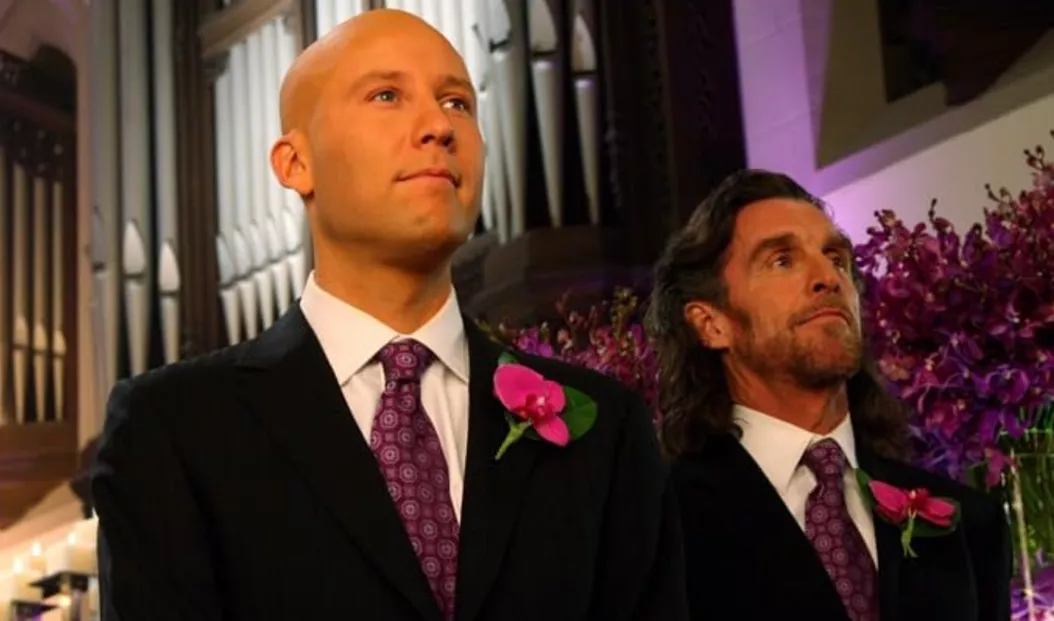 Lex and Lionel wait for Lana to come down the aisle during their wedding in Smallville.